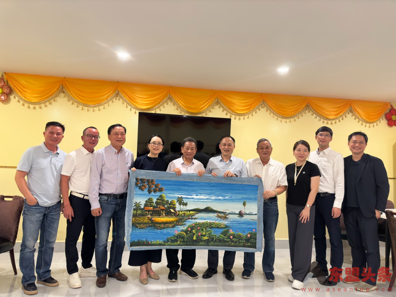 中国-东盟博览会秘书处副秘书长梁艺光拜访柬埔寨中国港澳侨商总会