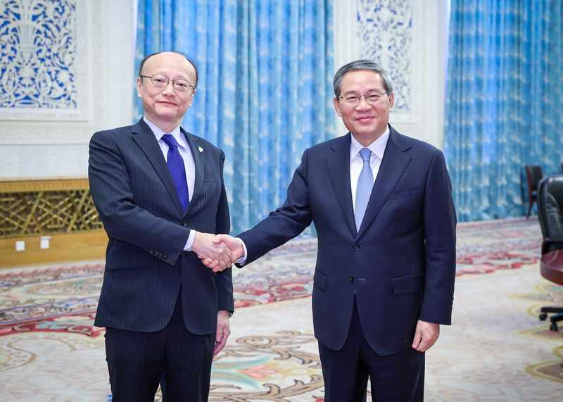 中国总理李强会见亚洲开发银行行长神田真人