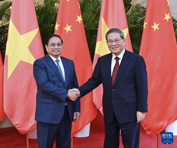 中国总理李强会见越南总理范明政 双方愿共同维护自由贸易和多边贸易体制