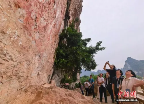 中国首个岩画“入遗”十周年 中外文博专家广西崇左交流保护发展经验
